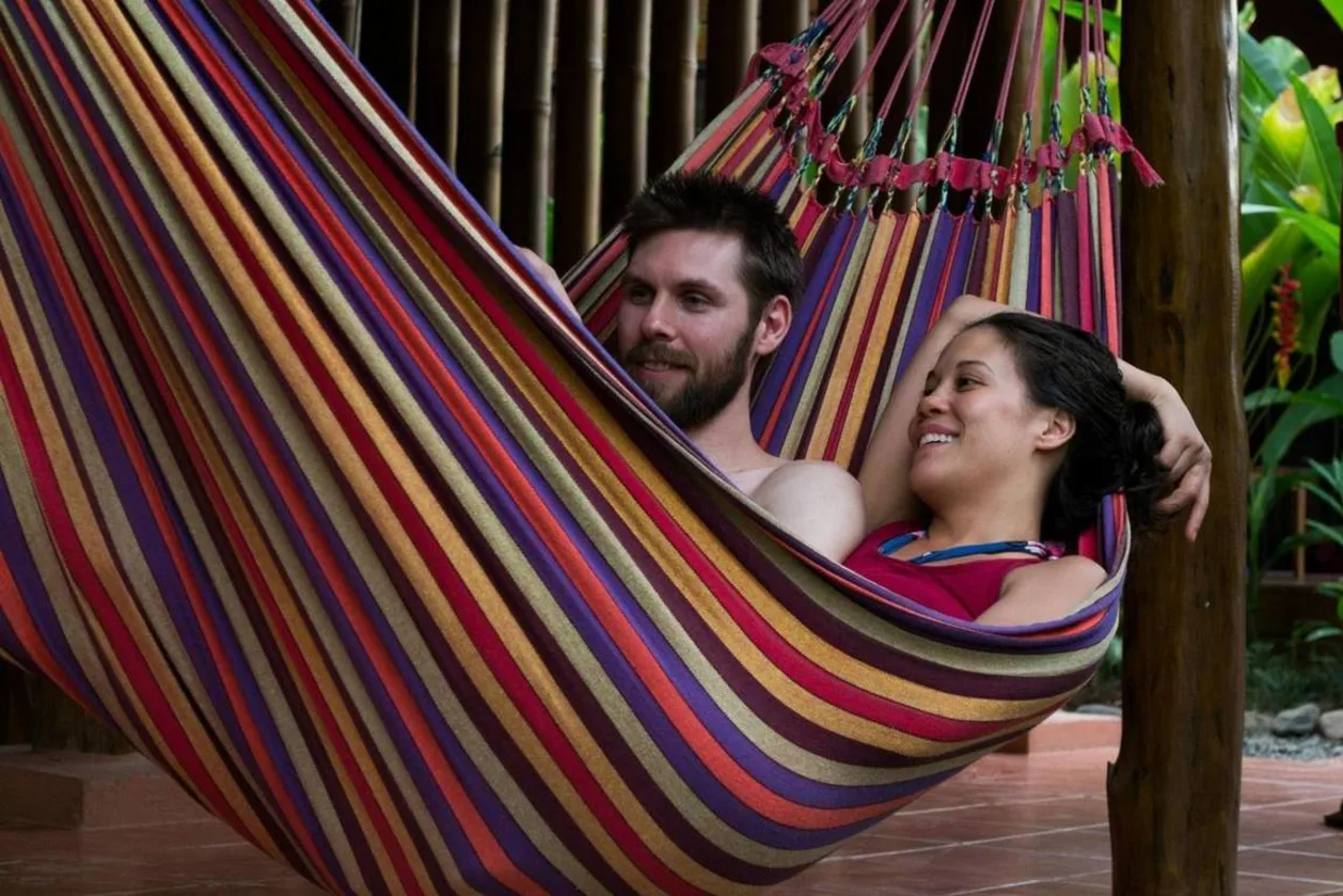 Couple in hammock at Bodhi Surf + Yoga